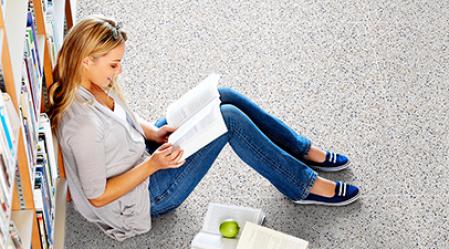 lady reading in library